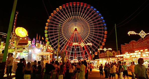 View of the Ferris wheel at the night fair in Malaga